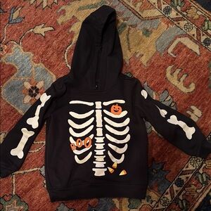 Black Skeleton Hoodie with Halloween Design